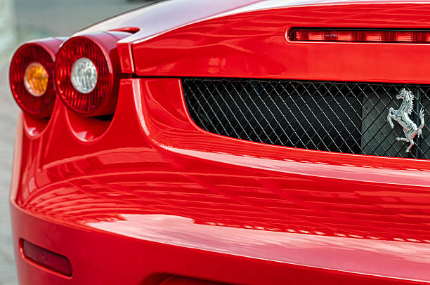 Budapest, Hungary - September 19th, 2015: The grill, left rear lamps and the emblem on the backside of a Ferrari F430 luxury sport car.