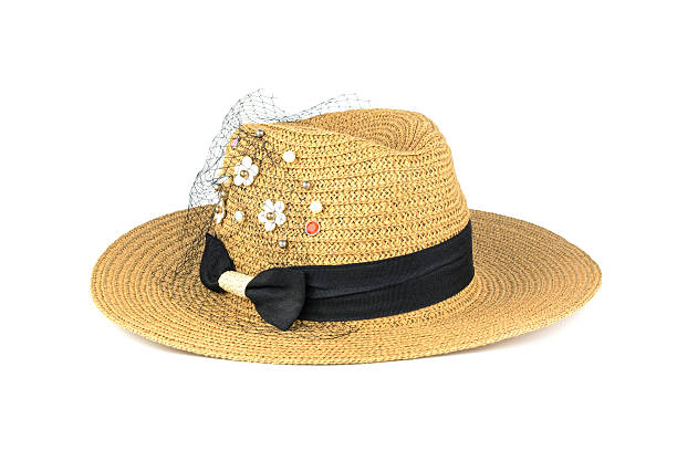 istock Pretty straw hat with flower isolated on white 500546966