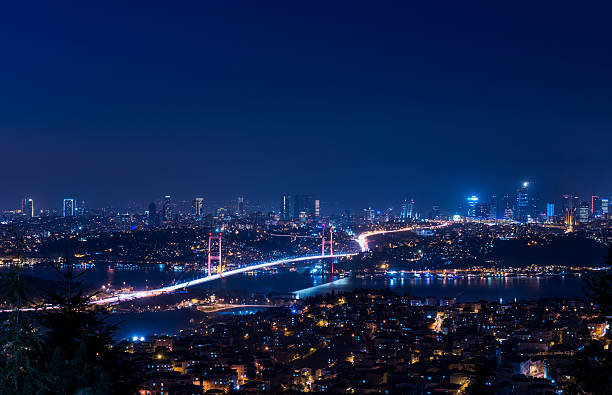 Bosphorus Bridge Bosphorus Bridge at night Istanbul / Turkey turkish culture photos stock pictures, royalty-free photos & images