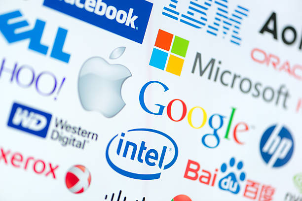 Top computer corporation companies Kiev, Ukraine - June 12, 2014: A logotype collection of well-known world top companies of computer technologies on a monitor screen. Include Google, Apple, Microsoft, Intel and other logos. big tech stock pictures, royalty-free photos & images