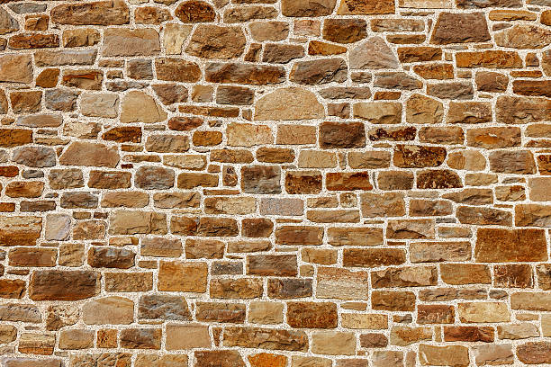 istock Wall built of natural stone 500555685