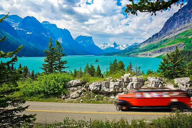 Photo of St. Mary Lake, mountains, Glacier National Park, road trip, tourism