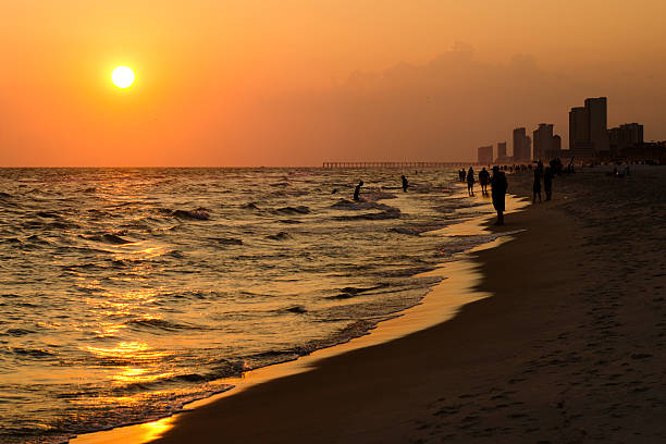 Shoreline of Panama City Beach at sunset stock photo