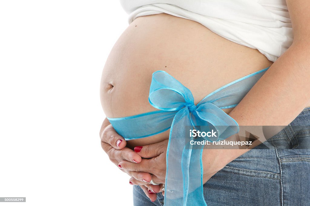 Beste Geschenk-schwangeren Bauch mit Blau Schleife - Lizenzfrei Bunt - Farbton Stock-Foto