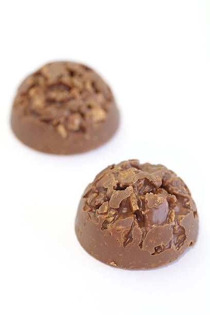 istock Sweet appetizer chocolate cookies on a white background 500559293