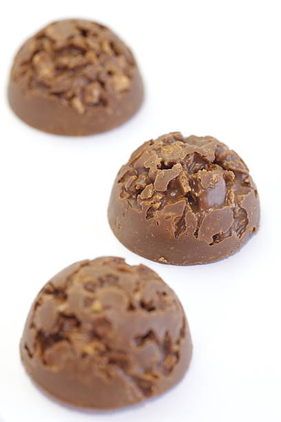 istock Sweet appetizer chocolate cookies on a white background 500559295