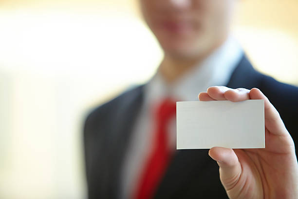 istock Businessman giving business card 500565070