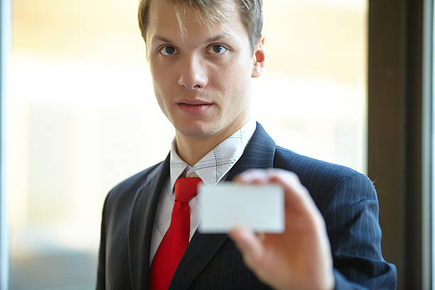 istock Businessman giving business card 500565216