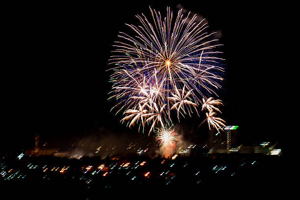 istock Brightly colorful fireworks in the night sky 500566330