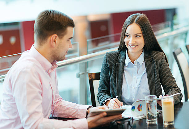 istock Modern business people signing contract over merger and acquisition 500566838