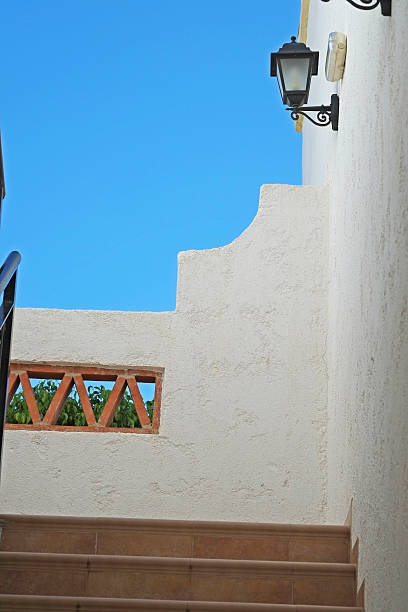istock Spanish white walls and stairs 500567674
