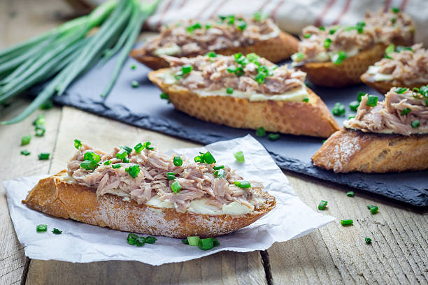 istock Sandwich with tuna, soft cheese and green onion 500571120