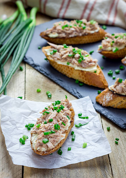 istock Sandwich with tuna, soft cheese and green onion 500571168
