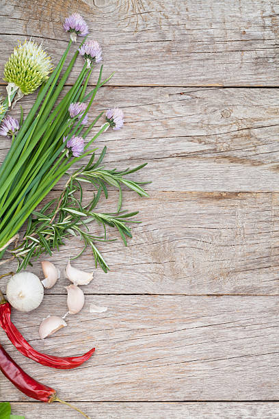 istock Fresh herbs and spices on garden table 500572968