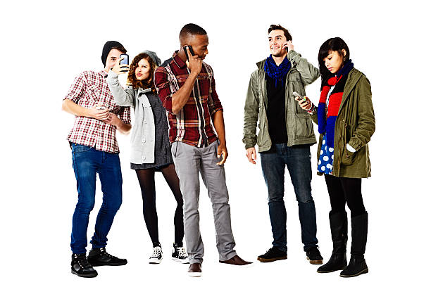 istock It's modern life! Five young people busy with their cellphones 500574605