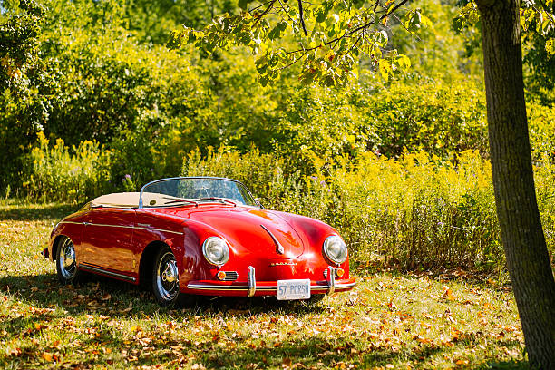 British Car Day in Canada Burlington, Ontario, Canada - September 20, 2015. One of the rare German made cars at the event, famous Porsche Spider. British Car Day is a classic car show hosted annually by the Toronto Triumph Club at one of the public Parks (Bronte Park) in Burlington (suburbs of Toronto), on the third Sunday of September. Since its inaugural event in 1984, it has grown in leaps and bounds, and now draws over 1,000 British cars and 8,000 spectators, with room to grow even bigger. British Car Day is open to vintage, classic and current British manufactured vehicles, including motorcycles.  vehicle accessory stock pictures, royalty-free photos & images
