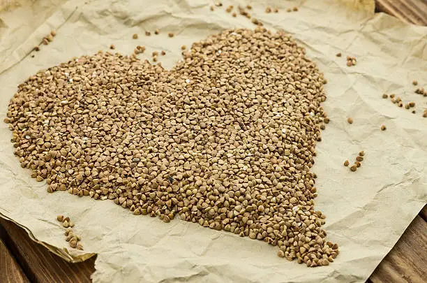 The ripe buckwheat seeds on the wrapping-paper