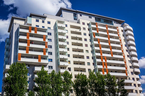 istock Rows of balconies in a white apartment building 500577966