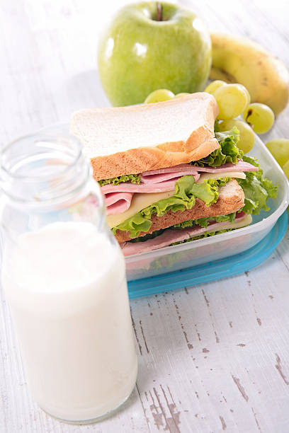 istock sandwich,milk and apple 500578160