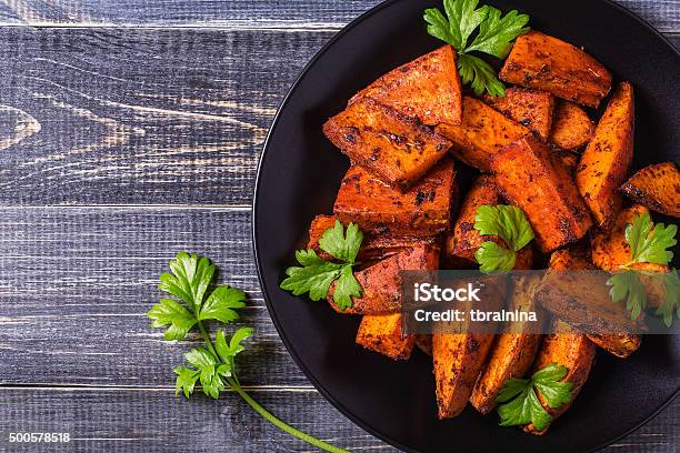 Homemade Cooked Sweet Potato With Spices And Herbs Stock Photo - Download Image Now