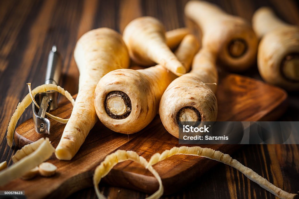 fresh parsnip Fresh parsnip on wooden board Agriculture Stock Photo