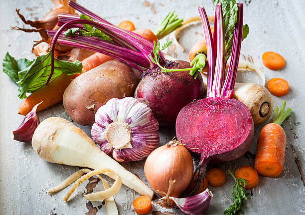 Root vegetables Assorted types of root vegetables on the old wooden background root vegetable stock pictures, royalty-free photos & images