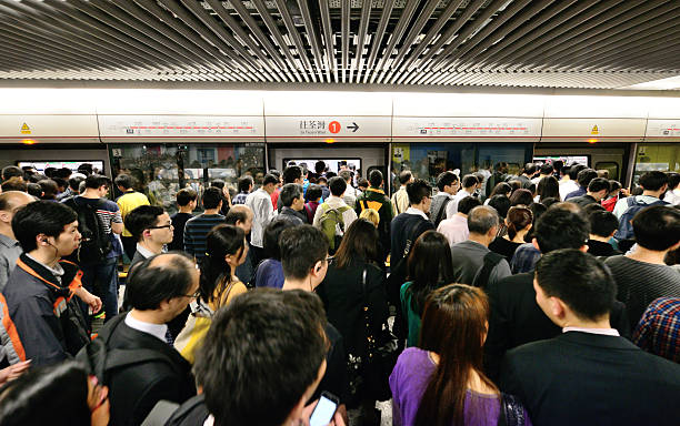 istock Hong Kong travellers in subway, motion blur 500580359
