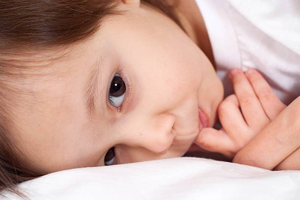 istock Pretty Caucasian young girl lying 500588612