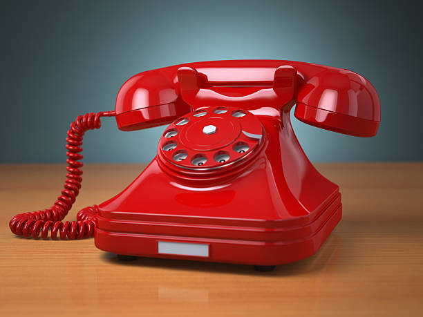 istock Vintage phone on green background. Hotline support concept. 500592365