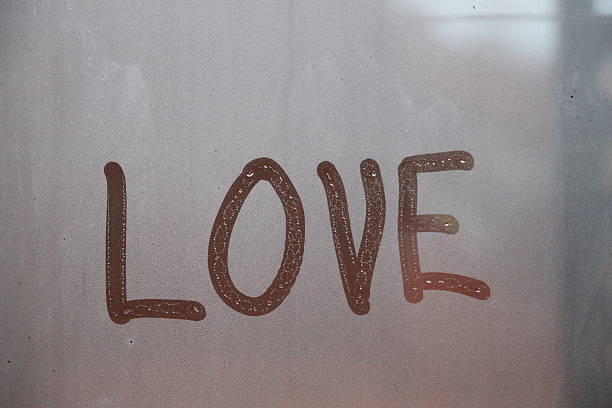 istock Word love written on glass 500592774