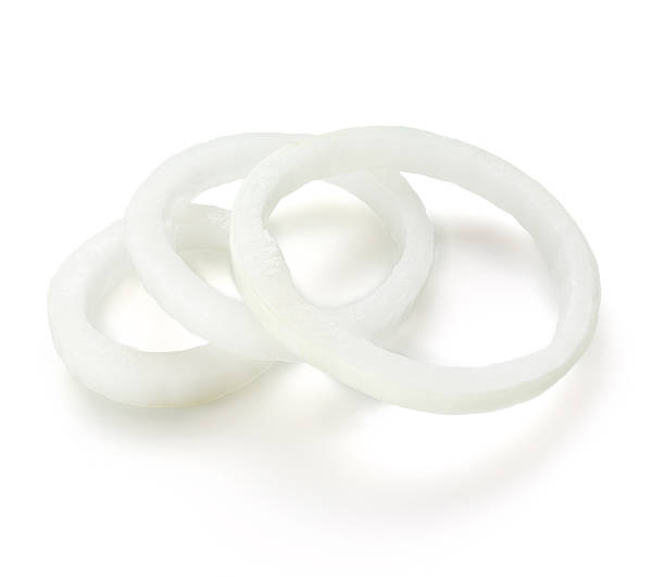istock Onion slices isolated on white background 500592993