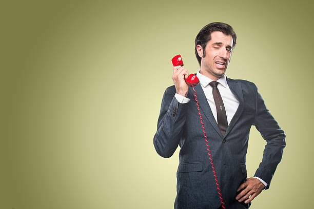istock Nerdy Office Worker With Vintage Telephone 500593173