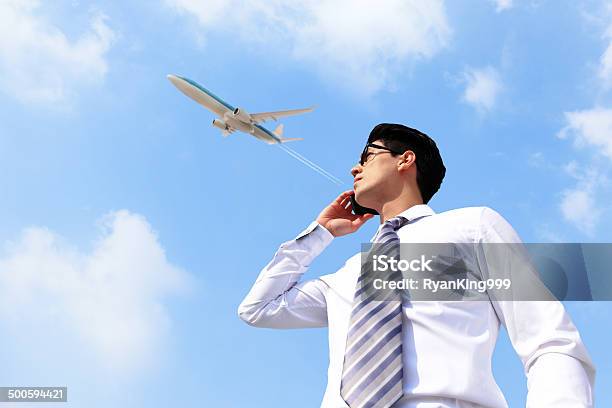 Business Man Talking On Smart Phone Stock Photo - Download Image Now - Adult, Adults Only, Air Vehicle