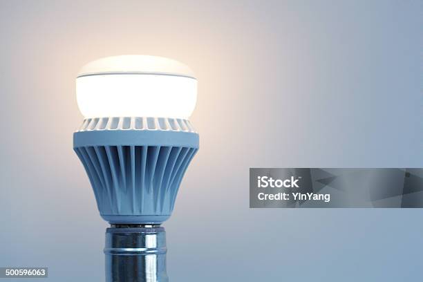 Lit Led Light Bulb An Energy Efficient Electricity Technology Idea Stock Photo - Download Image Now