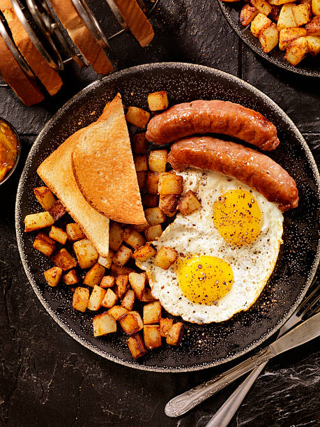 istock Breakfast with Sunny side up eggs and Sausage 500600110
