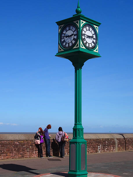 istock Image of iron clock tower painted green on Minehead beachfront 500600670