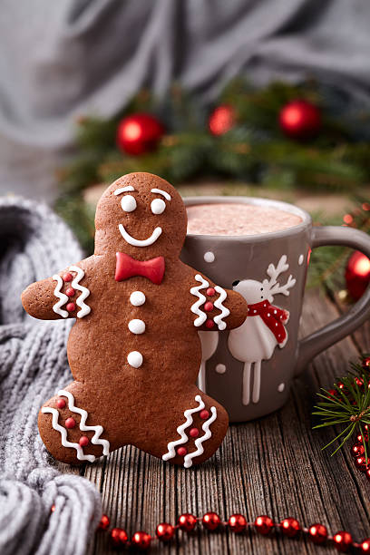 istock Hot chocolate or cocoa beverage with cinnamon and gingerbread man 500600842