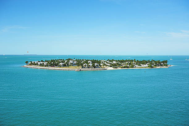 istock Round island in blue water 500602186