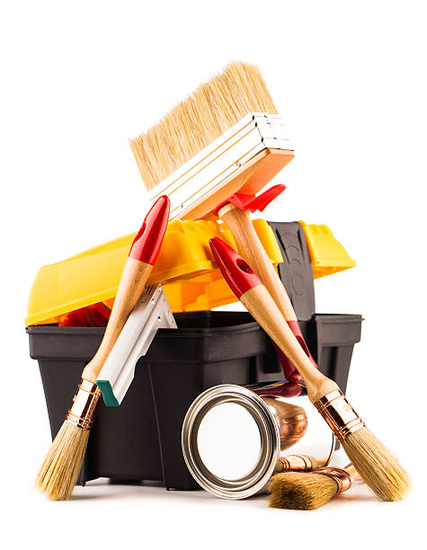 istock Can of paint with paintbrushes and toolbox isolated on white 500603612