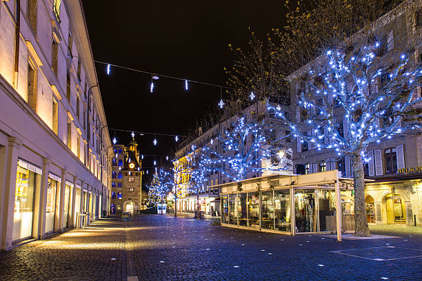 Geneva, Switzerland - December 13, 2014: The Molard square at night illuminated by Christmas decorations, in downtown Geneva.