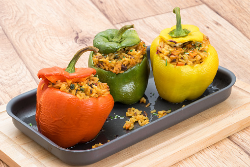Stuffed red, green and yellow Bell Peppers