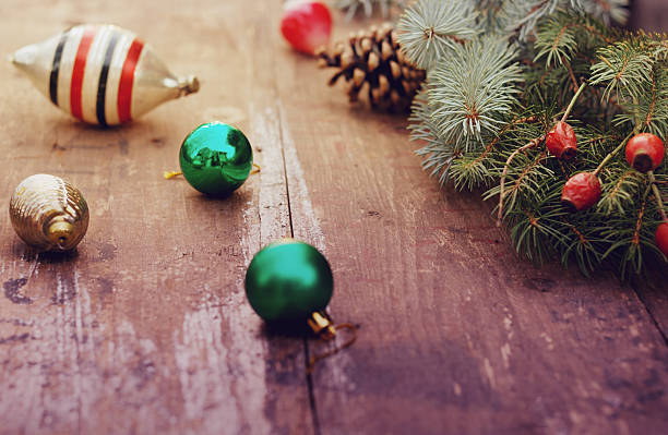 istock Christmas tree with retro decorations on rustic wooden boards, vintage 500613580