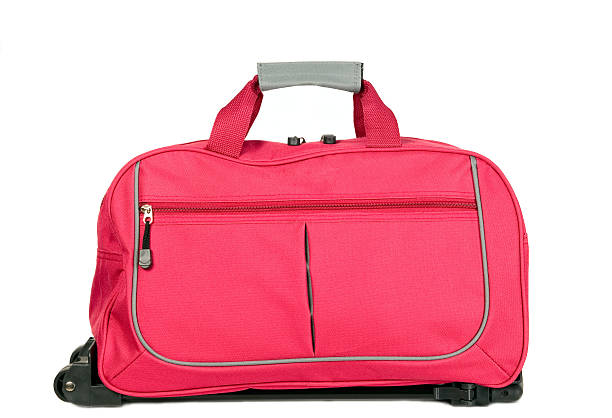 istock Pink luggage with wheels 500614967