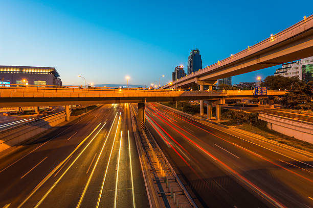istock Urban highway traffic at night 500615275