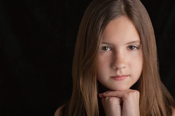 istock Brunette Girl Resting Chin On Hands 500616017