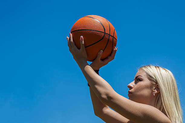 istock attractive female basketball player 500616041