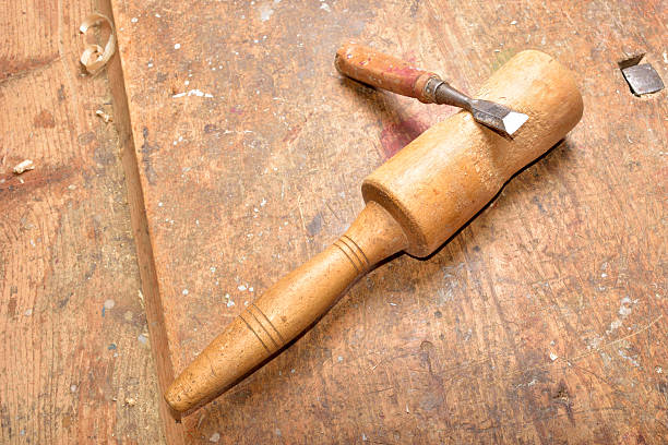 istock carpenter working with plane on wooden 500616824