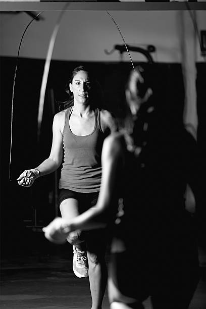 istock woman jumping rope on a boxing training 500616844
