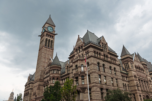 Old City Hall of Toronto against a cloudy sky
