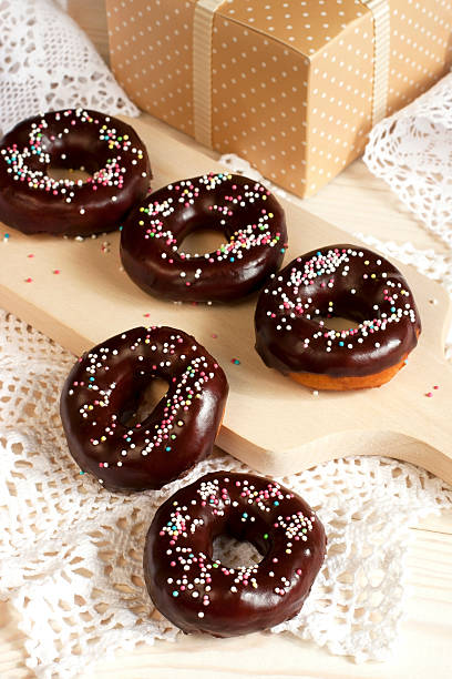 Tasty sweet donuts with chocolate